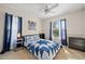 Comfortable bedroom featuring bright natural light and neutral walls at 7288 Castleberry Ter, Englewood, FL 34224
