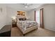 Cozy bedroom with neutral walls and a three-piece painting above the bed at 7288 Castleberry Ter, Englewood, FL 34224