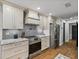 Well-equipped kitchen with stainless steel appliances and granite countertops at 7508 W Short Rd, Plant City, FL 33565