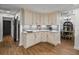 Modern kitchen with granite countertops and direct view to dining area at 7508 W Short Rd, Plant City, FL 33565
