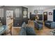 Comfortable living room features stylish decor, paneling, and ample seating at 7508 W Short Rd, Plant City, FL 33565
