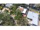 Aerial view of home with screened pool and brick driveway at 8238 30Th N Ave, St Petersburg, FL 33710