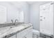 Bathroom featuring white subway tile in the shower and white cabinets at 8238 30Th N Ave, St Petersburg, FL 33710