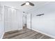Bright bedroom with wood-look floors and closet doors at 8238 30Th N Ave, St Petersburg, FL 33710