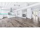 Bright, open kitchen with an island, marble fireplace, and stainless steel appliances at 8238 30Th N Ave, St Petersburg, FL 33710