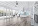 Spacious living area boasting hardwood floors, bright light, and a view of the kitchen at 8238 30Th N Ave, St Petersburg, FL 33710