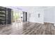 Bright living room featuring a modern floor, large windows, and open space at 8238 30Th N Ave, St Petersburg, FL 33710