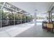 The screened lanai overlooks the pool area surrounded by lush landscaping, offering privacy at 8238 30Th N Ave, St Petersburg, FL 33710