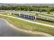 An impressive entrance to a community with fountains, landscaping, and well-maintained streets at 8598 Parsons Hill Blvd, Wesley Chapel, FL 33545