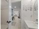 Bathroom view showcases the sink area and a glimpse into the adjoining rooms, creating an open feel at 8724 Mallard Reserve Dr # 101, Tampa, FL 33614