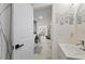 Bright bathroom view offers a glimpse into the adjacent rooms, enhancing the sense of space and connectivity at 8724 Mallard Reserve Dr # 101, Tampa, FL 33614