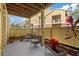 Spacious covered patio with seating area and views of well-maintained landscaping and nearby buildings at 8724 Mallard Reserve Dr # 101, Tampa, FL 33614