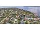 Aerial shot of the property's location within a residential area, highlighting its proximity to waterfronts and other real estate at 90 Bahama Cir, Tampa, FL 33606