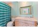 Light and airy bathroom with marble countertop and turquoise walls at 90 Bahama Cir, Tampa, FL 33606