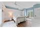 Cozy blue bedroom with a plush rug and a charming window seat at 90 Bahama Cir, Tampa, FL 33606