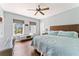 Bedroom with natural light, desk and hardwood floors at 90 Bahama Cir, Tampa, FL 33606