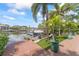 A private dock and boat lift allows for easy access to the water and a tranquil waterfront experience at 90 Bahama Cir, Tampa, FL 33606