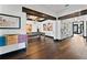 Stylish game room with a pool table, colorful art, and custom shelving for a touch of elegance at 90 Bahama Cir, Tampa, FL 33606