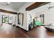 Elegant hallway with hardwood floors, a decorative ceiling fan, and stylish decor at 90 Bahama Cir, Tampa, FL 33606