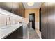 Well-equipped laundry room boasts custom cabinetry, modern appliances, and ample counter space at 90 Bahama Cir, Tampa, FL 33606