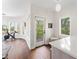 Bright living room features hardwood floors and abundant natural light at 90 Bahama Cir, Tampa, FL 33606