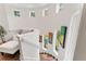 Unique stairwell with curved design, multiple windows offering natural light, and artistic decor at 90 Bahama Cir, Tampa, FL 33606