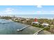 Breathtaking aerial view of the coastal home, showcasing its prime waterfront location with private docks at 9048 Wharf Ave, Placida, FL 33946