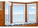 Bay window with seating overlooking waterfront at 9048 Wharf Ave, Placida, FL 33946