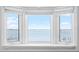 Bay window with seating overlooking waterfront at 9048 Wharf Ave, Placida, FL 33946