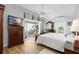 Light-filled main bedroom boasts waterfront views and offers a peaceful retreat with deck access at 9048 Wharf Ave, Placida, FL 33946
