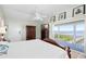 Main bedroom with deck access, features waterfront views and offers a peaceful retreat at 9048 Wharf Ave, Placida, FL 33946