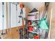 Functional storage room with tools and shelving, providing ample space for organization at 9048 Wharf Ave, Placida, FL 33946