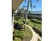 Lush courtyard featuring mature trees, manicured lawns, and winding paths, perfect for leisurely strolls at 10032 65Th N Ave # 14, St Petersburg, FL 33708