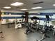 Well-equipped gym with treadmills, stationary bikes, and weightlifting equipment at 10032 65Th N Ave # 14, St Petersburg, FL 33708