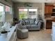 Charming living room with comfortable seating, natural light, and easy access to the kitchen, perfect for entertaining at 10032 65Th N Ave # 14, St Petersburg, FL 33708