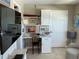Functional home office space featuring built-in shelving, a desk, and plenty of natural light for a productive work environment at 10032 65Th N Ave # 14, St Petersburg, FL 33708