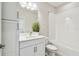 Bright bathroom featuring a single vanity with a bathtub and a shower at 11146 Rustic Timber Loop, San Antonio, FL 33576