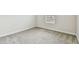 A standard bedroom with neutral carpet and one window at 11146 Rustic Timber Loop, San Antonio, FL 33576