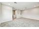 Spacious carpeted bonus room featuring recessed lighting, neutral trim, and multiple entries at 11146 Rustic Timber Loop, San Antonio, FL 33576