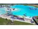 View of a beautiful lagoon offering swimming, water slides and recreation in a Primary planned community at 11146 Rustic Timber Loop, San Antonio, FL 33576
