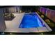 A luxurious pool and spa with integrated lighting create a stunning backyard retreat perfect for relaxation at 11146 Rustic Timber Loop, San Antonio, FL 33576