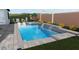 A luxurious pool and spa with water features, creating a stunning backyard oasis for relaxation and entertainment at 11146 Rustic Timber Loop, San Antonio, FL 33576