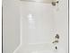 Clean shower stall featuring white subway tile, and classic bronze shower head and faucet at 11146 Rustic Timber Loop, San Antonio, FL 33576
