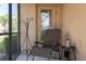 Cozy screened porch furnished with a chair and small table for relaxing outdoors at 11704 Castine St, New Port Richey, FL 34654