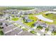 Aerial view of the property in a Primary-planned community with mature trees and well-maintained streets at 12916 Brookside Moss Dr, Riverview, FL 33579