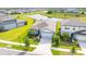 Charming single-story home with a well-manicured lawn, lush landscaping, and a two-car garage at 12916 Brookside Moss Dr, Riverview, FL 33579