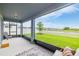Enjoy outdoor living on this screened patio with views of the landscaped backyard at 12916 Brookside Moss Dr, Riverview, FL 33579