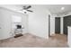 Room with carpet flooring and basic room features; including door access and side printer at 14100 Holly Hammock Ln, Brooksville, FL 34613