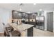 A modern kitchen featuring stainless steel appliances and beautiful countertops at 14100 Holly Hammock Ln, Brooksville, FL 34613