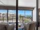 Comfortable balcony seating area with views of the city and the serene ocean at 1460 Gulf Blvd # 509, Clearwater Beach, FL 33767